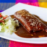 Enchiladas · Two corn tortillas filled with meat or cheese topped with sour cream only moles enchiladas c...