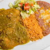 Chile Rellenos · Spicy. Two savory mild pasilla chiles filled with Monterey Jack and Cheddar cheese delicatel...