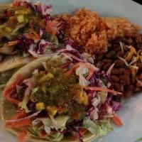 Fish Tacos Snapper · A traditional classic! Fish simmered in our fresh homemade tomatillo green sauce with fresh ...