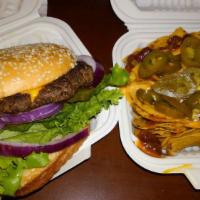 Colossal Burger · 1/2 lb patty with lettuce, red onion, pickles, tomato, and cheese.