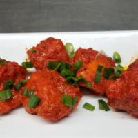 Paneer Chili · Chunks of our homemade cheese (paneer) mixed with bell peppers, sweet onions, fresh green ch...
