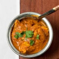 Chicken Curry · Boneless pieces of chicken cooked to perfection in a zesty gravy with ginger, garlic & fresh...