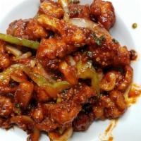 Chicken Chili · Boneless pieces of chicken battered & lightly fried, sautéed with bell peppers, onions, & fr...