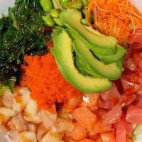 Mix Fish Poke Bowl · Mixed fish with rice, lettuce, cucumber, carrot, seaweed, green bean with special sauce spic...