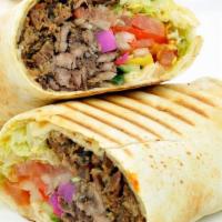 PHILLY BEEF WRAP · Thinly grilled beef w/ mushroom, onions, peppers, hummus, lettuce, tomatoes, pickles, and ta...