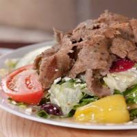 MOBSTER gyro salad · Beef Gyro Salad - Thinly grilled gyro beef served over Greek salad; Fresh lettuce, tomatoes,...