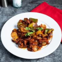 Chicken Chilli · Fabulous marinated cubes of farm chicken, bell peppers, onions and tomatoes marinated in an ...
