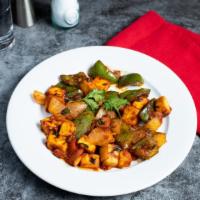 Really Groovy Paneer Chilli · Marinated cubes of cottage cheese, bell peppers, onions and tomatoes marinated in an Indian ...