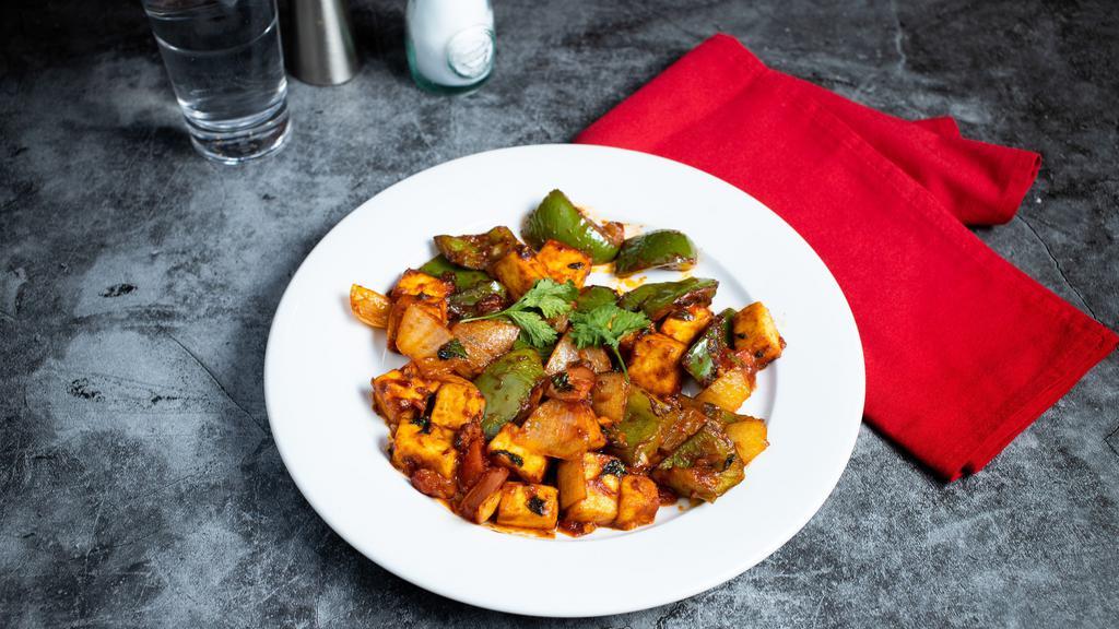 Really Groovy Paneer Chilli · Marinated cubes of cottage cheese, bell peppers, onions and tomatoes marinated in an Indian chili sauce.