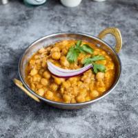 Chosen Chana · Chicks and dudes love this dish of chickpeas cooked in a tomato and onion gravy with Indian ...