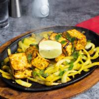 Promiscuous Paneer Kebab · Cottage cheese marinated with fresh ground spices and baked in an Indian clay oven until coo...