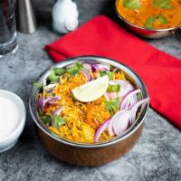 Funky Chicken Biryani · Juicy chicken breasts cooked with Indian spices and basmati rice. Served with house raita.