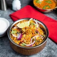 Lamb Biryani · Juicy lamb cooked with Indian spices and basmati rice. Served with house raita.