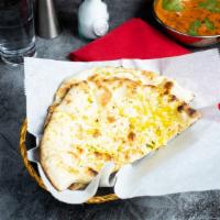 Garlic Naan · Bread stuffed with chopped fresh garlic and baked.