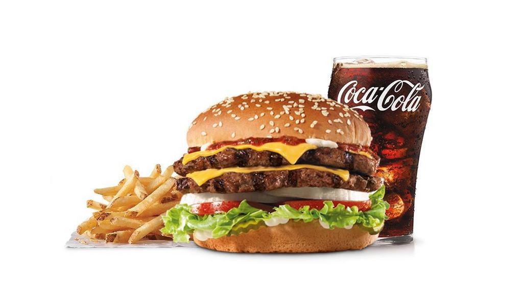Super Star® With Cheese Combo · Two charbroiled all-beef patties, two slices of melted American cheese, lettuce, tomato, sliced onions, dill pickles, Special Sauce, and mayonnaise on a seeded bun. Served with Fries and a Soft Drink.