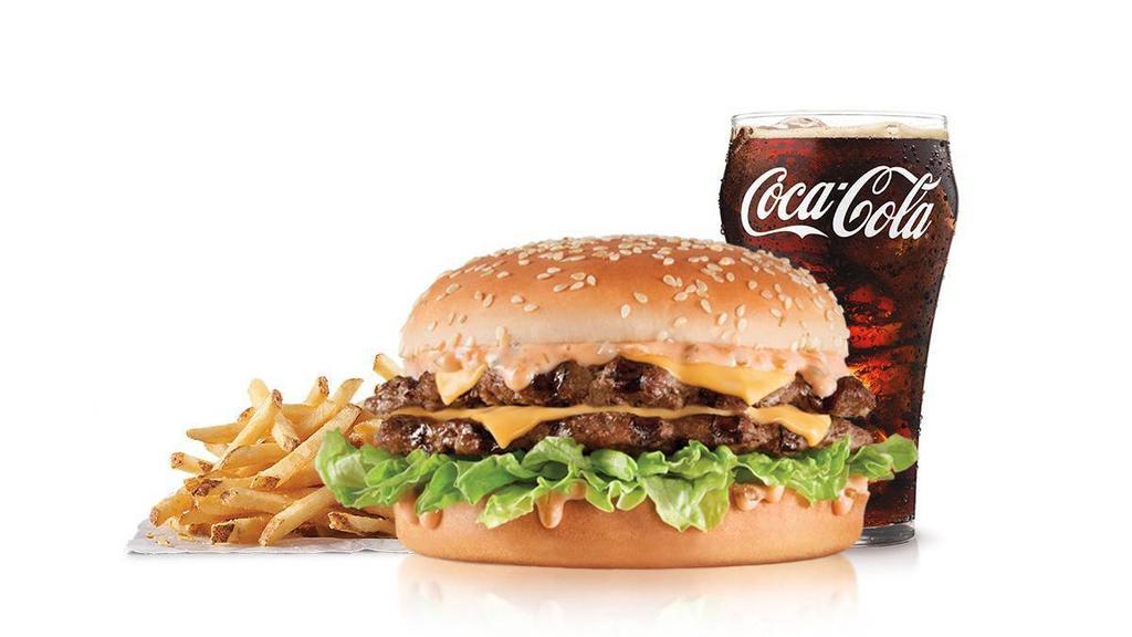 The Big Carl® Combo · Two charbroiled all- beef patties, our Classic Sauce, two slices of American cheese, and lettuce all on a seeded bun. Served with Fries and a Soft Drink.