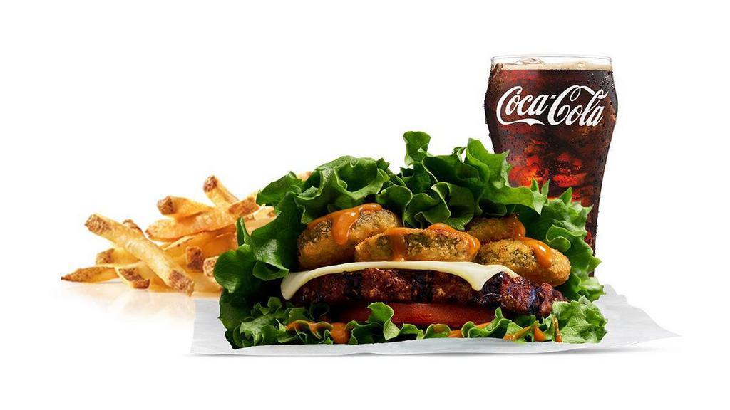 Single Beyond™ Wraptor Burger Combo · A 100% plant-based Beyond Burger®, charbroiled over an open flame, topped with sweet and savory Amber sauce, Swiss cheese, fried zucchini, and tomatoes; served in crisp green leaf lettuce. Served with fries and a beverage.