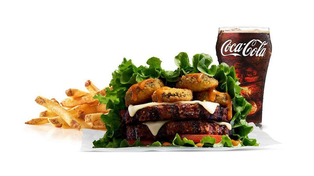 Double Beyond™ Wraptor Burger Combo · Two of our 100% plant-based Beyond Burgers®, charbroiled over an open flame, topped with sweet and savory Amber sauce, Swiss cheese, fried zucchini, and tomatoes; served in crisp green leaf lettuce. Served with fries and a beverage.