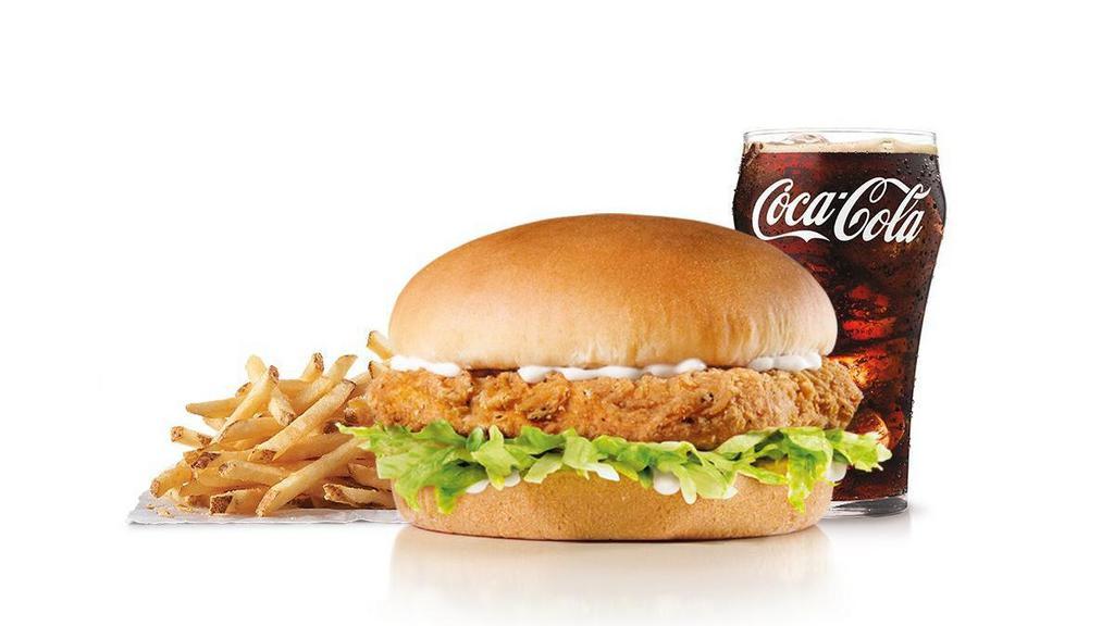 Spicy Chicken Sandwich Combo · Spicy Chicken, lettuce and mayonnaise on a plain bun. Served with Fries and a Soft Drink.