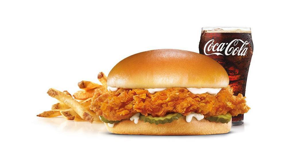 Hand-Breaded Chicken Sandwich Combo · Premium, all-white chicken fillet, hand dipped in buttermilk, lightly breaded and fried to a golden brown, garlic pickle and mayonnaise served on a potato bun. Served with Fries and a Beverage.