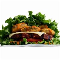 Single Beyond™ Wraptor Burger Burger · A 100% plant-based Beyond Burger®, charbroiled over an open flame, topped with sweet and sav...