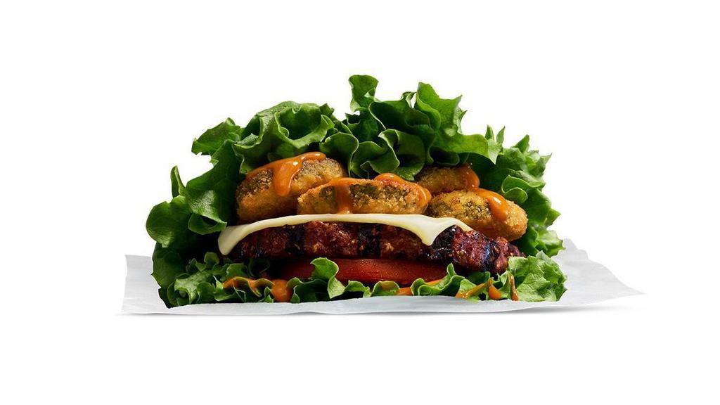 Single Beyond™ Wraptor Burger · A 100% plant-based Beyond Burger®, charbroiled over an open flame, topped with sweet and savory Amber sauce, Swiss cheese, fried zucchini, and tomatoes; served in crisp green leaf lettuce.