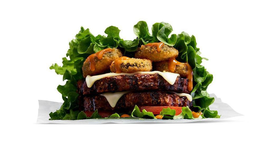 Double Beyond™ Wraptor Burger · Two of our 100% plant-based Beyond Burgers®, charbroiled over an open flame, topped with sweet and savory Amber sauce, Swiss cheese, fried zucchini, and tomatoes; served in crisp green leaf lettuce..