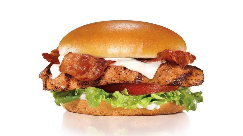 Charbroiled Chicken Club™ Sandwich · Charbroiled chicken breast, two strips of bacon, melted Swiss cheese, lettuce, tomato and mayonnaise on a potato bun..