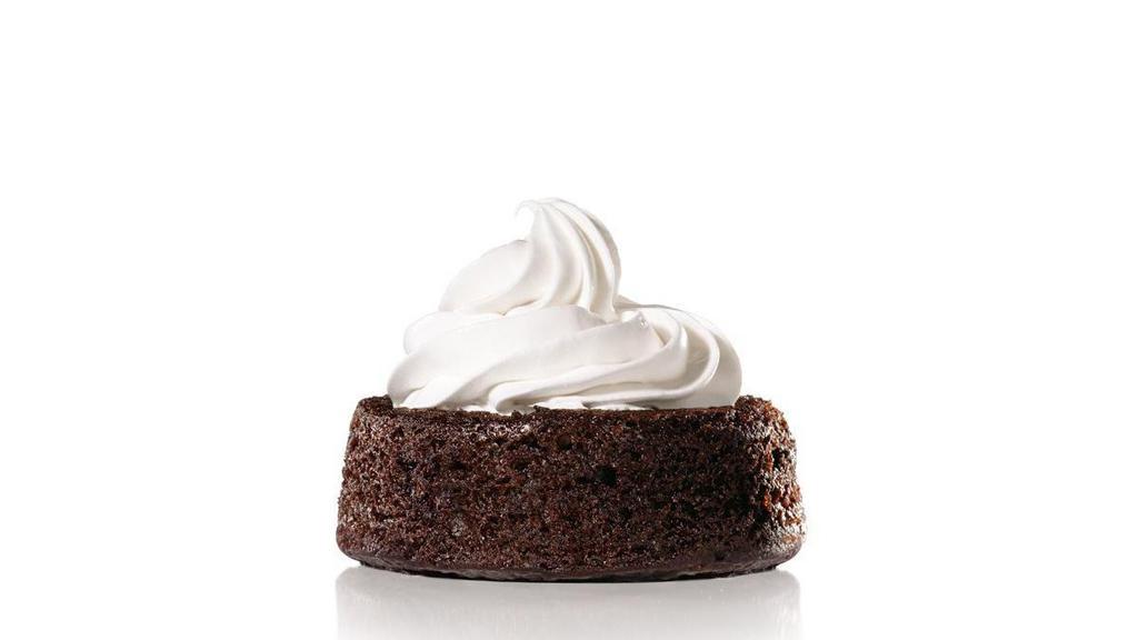 Chocolate Cake · Rich chocolate cake topped with frosting.
