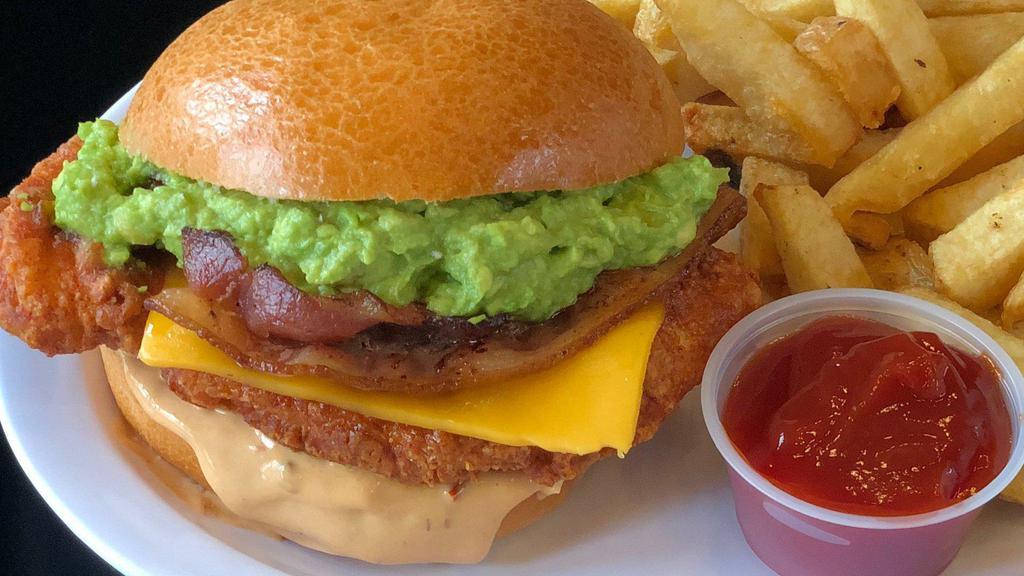 Holy Bacon Guacamole Fried Chicken Sandwich · Buttermilk fried chicken, Cheddar cheese, bacon, chipotle remoulade, guacamole, and served on a toasted bun.