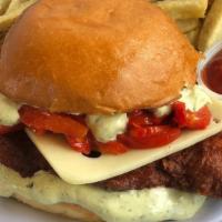 Italiano Fried Chicken Sandwich · Buttermilk fried chicken, roasted red peppers, pesto mayonnaise, Swiss cheese, and served on...