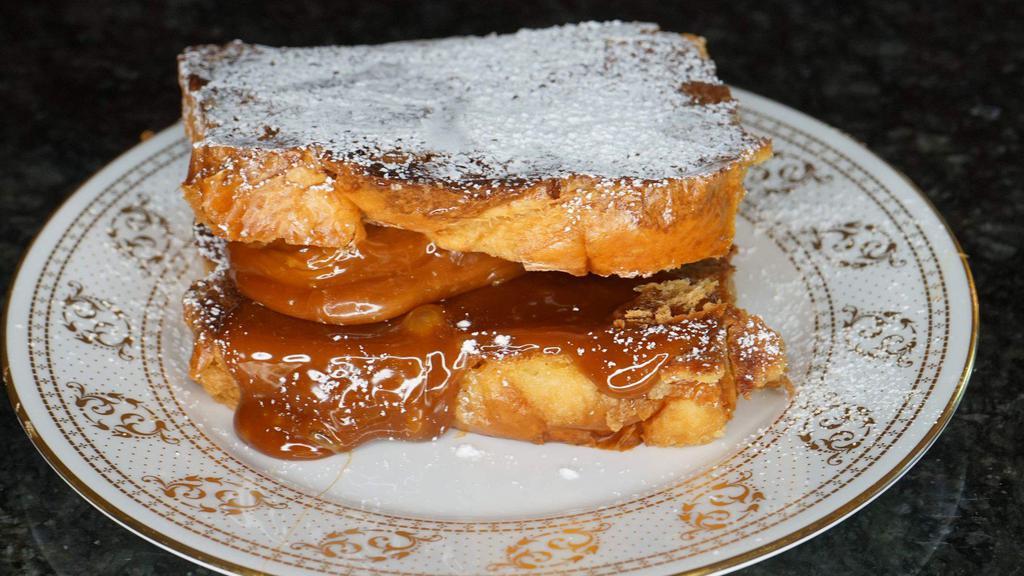 Salted Caramel French Toast Sandwich · Gooey and delicious salted caramel. Served with butter and syrup.