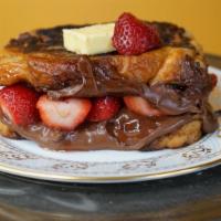 Strawberry ＆ Nutella French Toast Sandwich · Strawberries and Nutella can we say more. Served with butter and syrup.