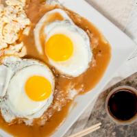 Loco Moco · Savory hom made hamburger patties over rice covered with brown gravy and topped with eggs se...
