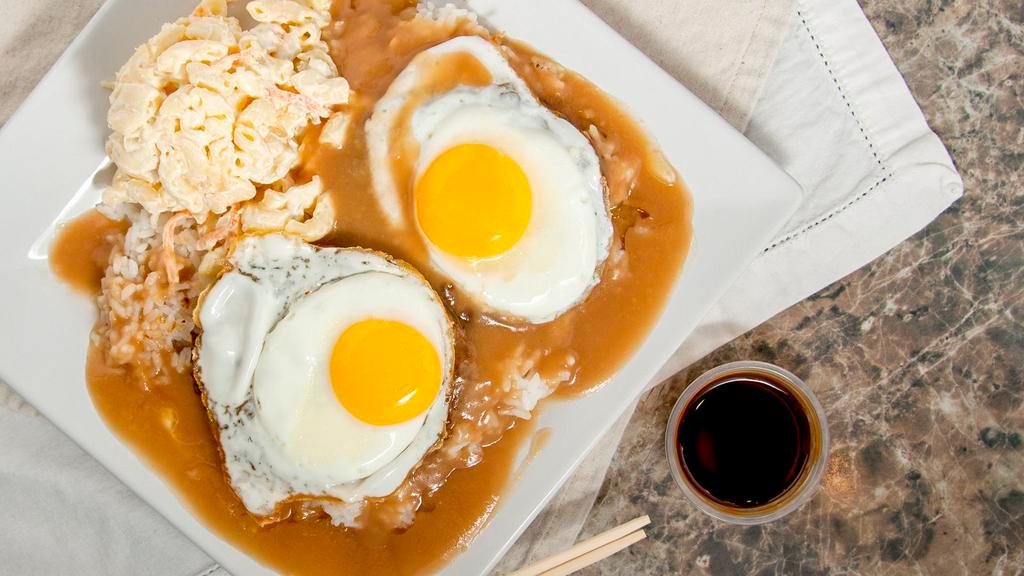 Loco Moco · Mini: (370 cal); reg: (725 cal). Savory homemade hamburger patties over rice covered with brown gravy and topped with eggs. Several island style. A local favorite.