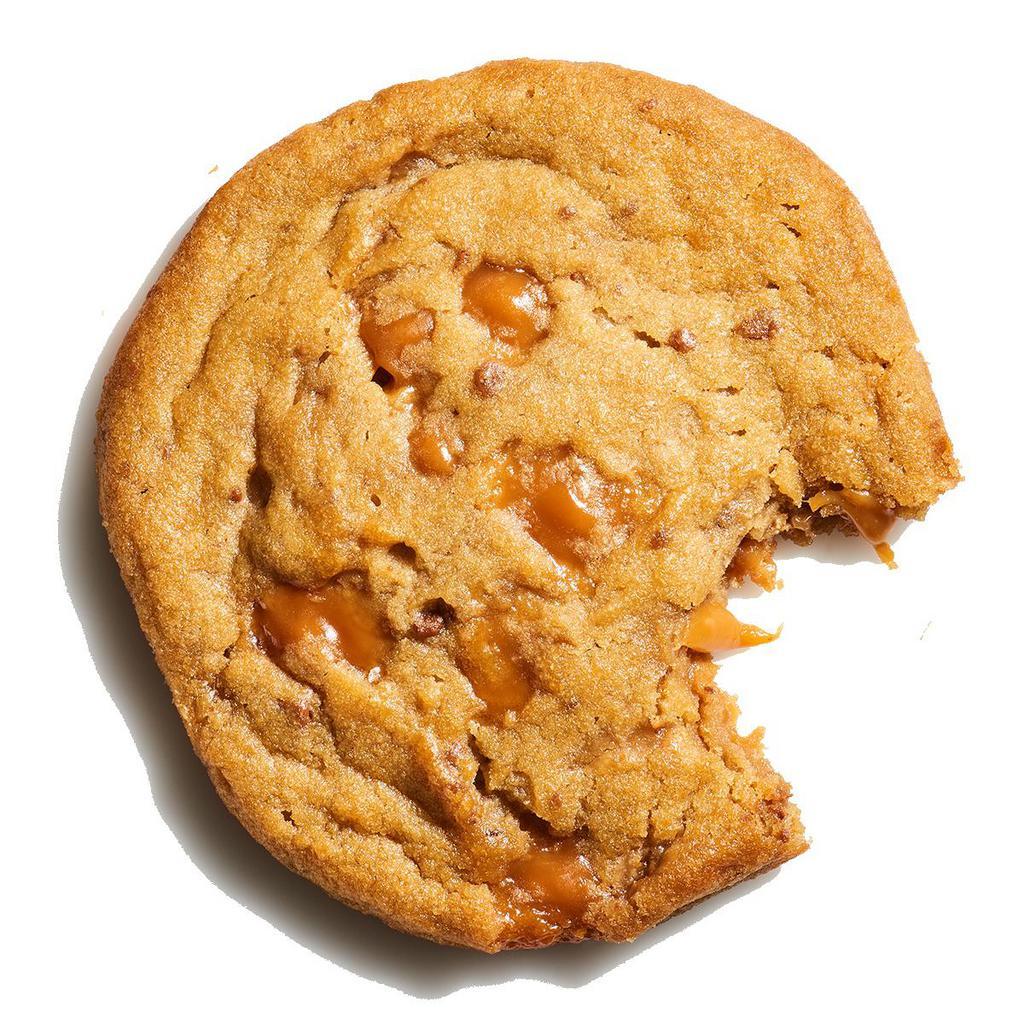 Salted Caramel · Indulgent, sweet caramel and savory sea salt baked into a Deluxe-sized sugar cookie base. Please note this cookie contains toffee, which contains almonds.