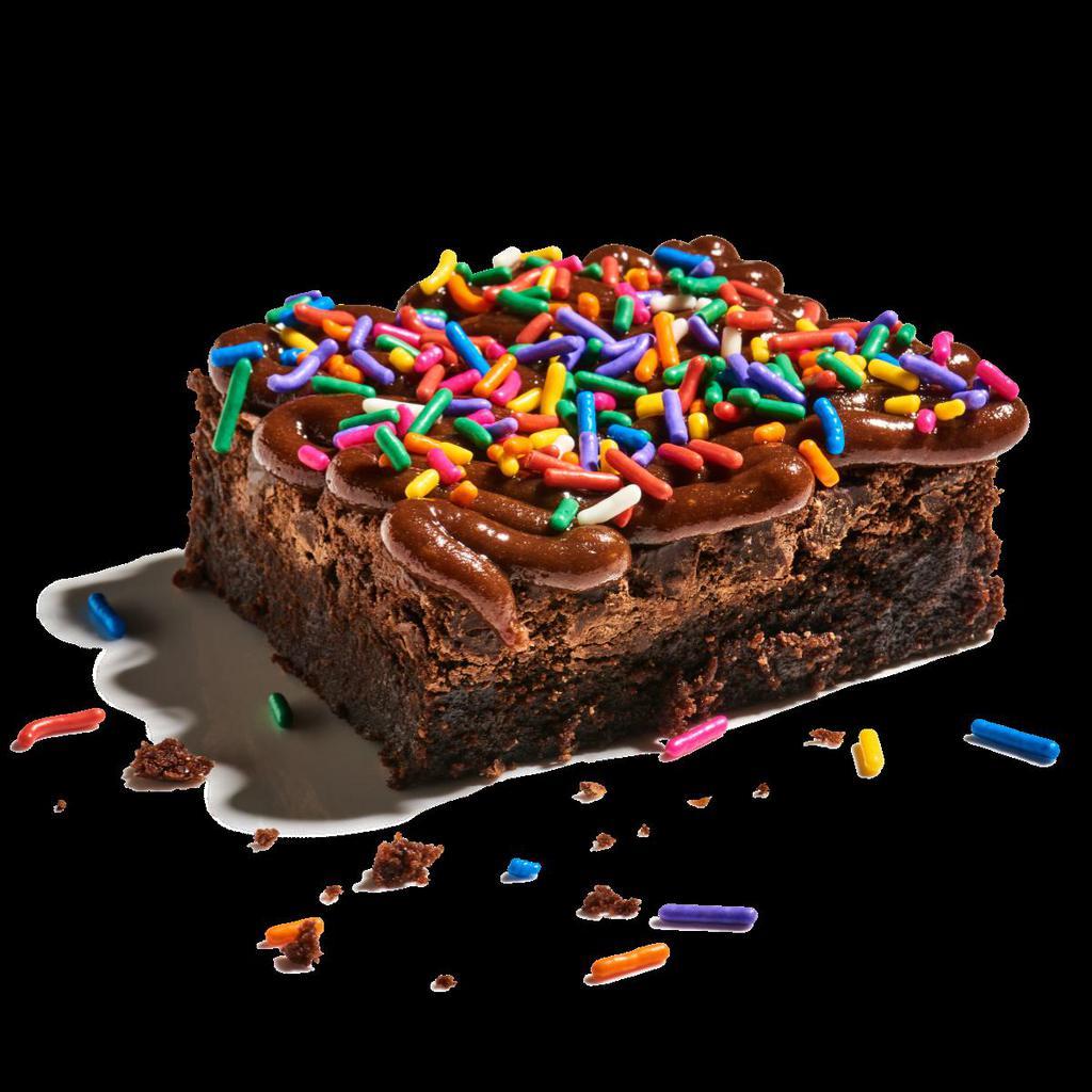 Loaded Brownie · A chocolate lover’s dream. A fudgy, chocolate chip brownie slathered in chocolate cookie butter for the ultimate sweet, rich snack. Guaranteed happiness. Add any toppings you want for a double loaded brownie.