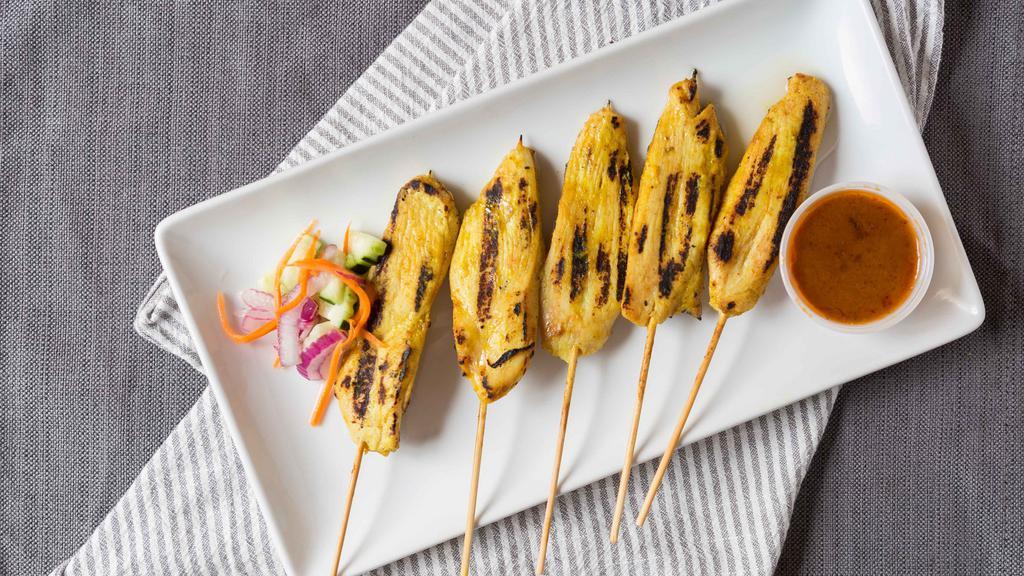 #4. Siam Satay · Charcoal broiled chicken or beef skewers marinated in Thai spices and served with peanut sauce and a cucumber salad.