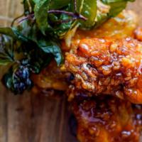 #6. Spicy Angel Wings · Fried chicken wings with fresh chili, garlic and fried basil.