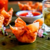 #13 Crab rangoon · Fried wonton stuffed with imitation crabmeat, cream cheese onion, celery served with sweet a...
