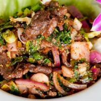 #9. Mint Leaf Surprise · Grilled pork or beef seasoned with mint leaves, lime juice, chili, onions, and rice powder.