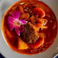 #20. Mas-Sa-Man Beef · Tender cubed beef simmered in a mild curry with potatoes, onions, peanuts and coconut milk.