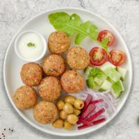 Fad Falafel Balls · Baked and fried mixture of garbanzo beans, fava beans, coriander, cumin, parsley and onions....