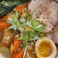 Curry Ramen / カレー ラーメン · Iconic Japanese curry mixed with flavorful tonkotsu broth creates this tasty curry ramen. To...