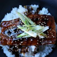Unagi Don · Smoked BBQ eel over rice.
