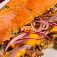 Philly Cheese Steak · Slow roasted steak, grilled onions, melted cheese, add your favorite toppings.