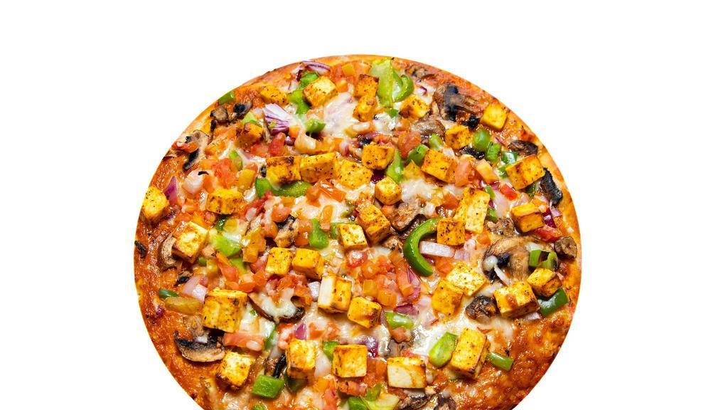 Paneer Tikka Masala Pizza · Vegetarian delight! Fresh tikka masala sauce as the based topped with masala paneer, chopped red onions, bell peppers, diced tomatoes, cilantro, green chili garlic, ginger, chopped mushrooms, green onions and Indian spices