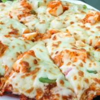 Chili Paneer Pizza · Exquisite paneer pizza with chili sauce, garlic, ginger, diced red tomatoes, green chill, ch...