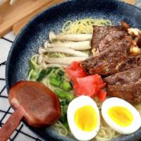 Beef Ramen · Toppings: egg, corn, wakame, mushroom, green onion.