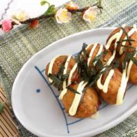 Takoyaki (6 Pieces) · Deep-fried balls stuffed with octopus.